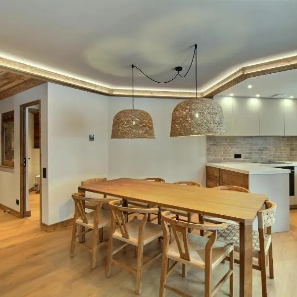 ARC 1950 - Appartement 8 personnes Duplex Cheminée - ski aux pieds - Sauna, Hammam, Jacuzzi, Piscine, hotel i Arc 1950