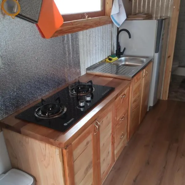 Departamento 2 villa la dehesa โรงแรมในเนลตูเม