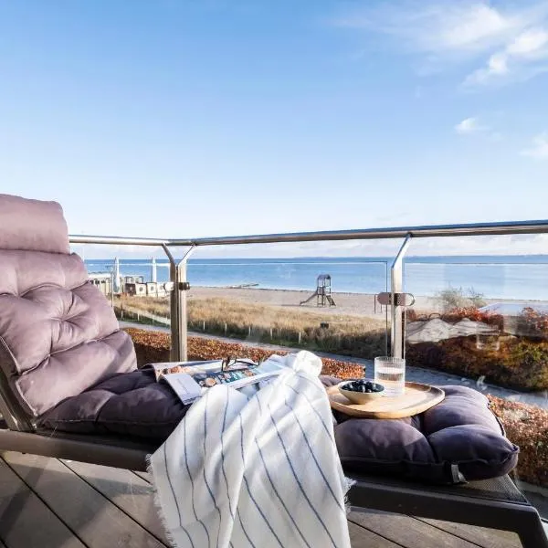Büngers Apartment-Hotel mit Sommerstrandkorb & Gartensauna, hotel in Strande