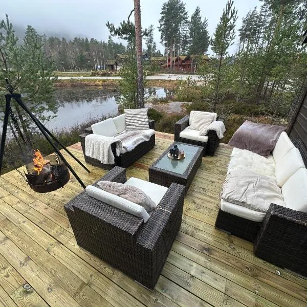 Cozy cabin with great view and immediate proximity to the ski resort and swimming area, Hotel in Vradal
