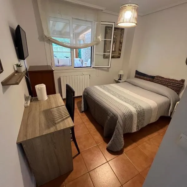 Habitación con baño privado, hotel Boó de Piélagosban