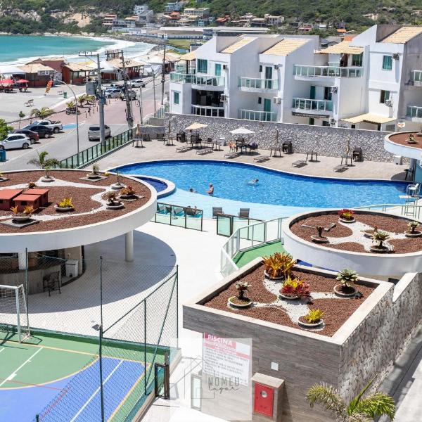 Condomínio Club a 50m PRAIA dos Anjos - Unidades com 2 QUARTOS, PISCINA, estacionamento e portaria 24h - Área de lazer 3000m, wi-fi 800MB, churrasqueira e cozinha completa