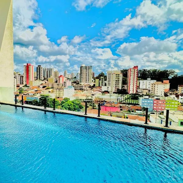 APTO TESLA Novo,com Piscina e Ar condicionado, hotel in São Carlos