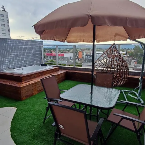 Apartamento Sofisticado Ed Del Paine terraço com hidro, hotel in Capão da Canoa