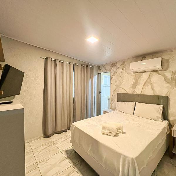 Apto completo com Ar, Wi-fi e Smart TV - 5 min da Praia