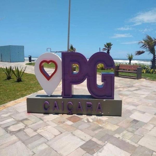 Pé na areia praia caiçara