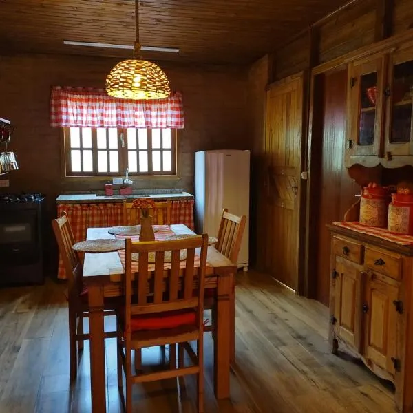 Recanto Sol Maior - Casa Lírio, hotel in Sapucaí-Mirim