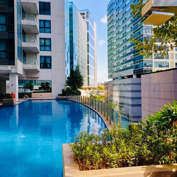 BGC 1BR, Steps to Mitsukoshi & Uptown Malls, 300Mbps Fiber 15J, hotel en Manila