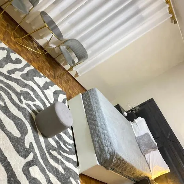 Quartos privados em uma casa comum, hotel v Lubangu