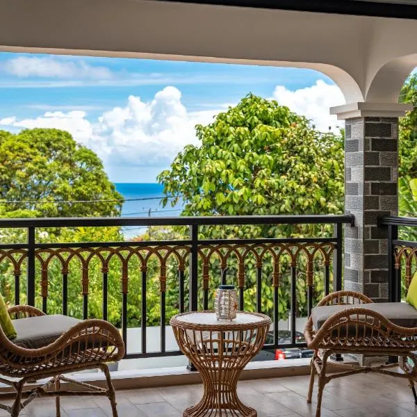 Charme Du Villlage, hotel in Anse aux Pins