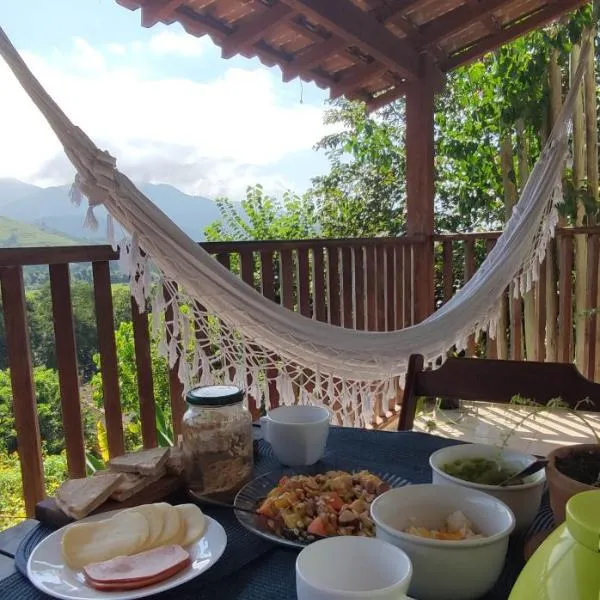 Suíte com varanda privativa na Casa Mirante