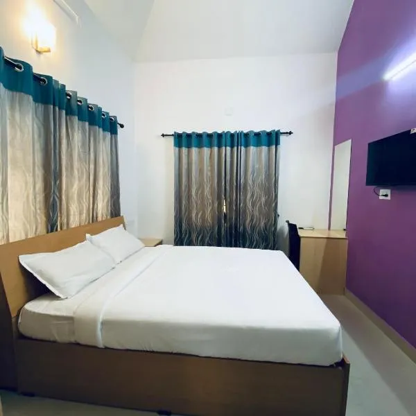 Berghof villa Rooms, hotel v mestu Cochin