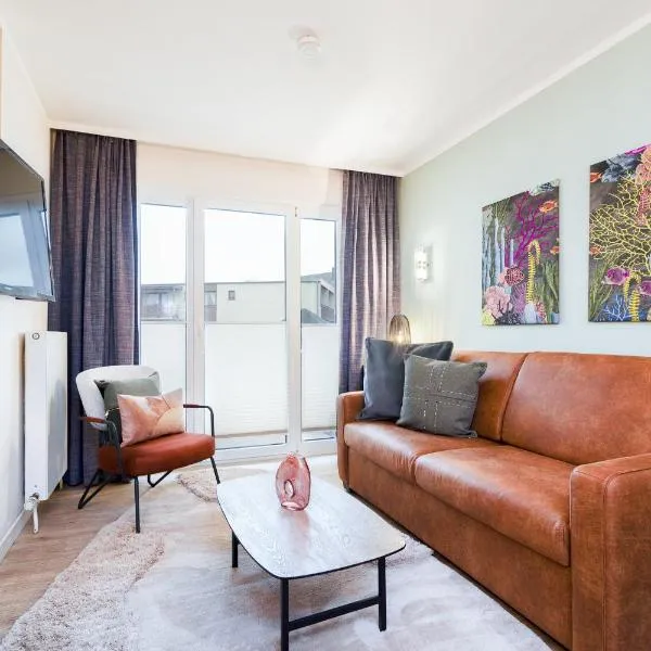 Das Solaris 5 Beach Apartment mit Balkon, Gemeinschaftssauna und Grillplatz, ξενοδοχείο σε Grömitz