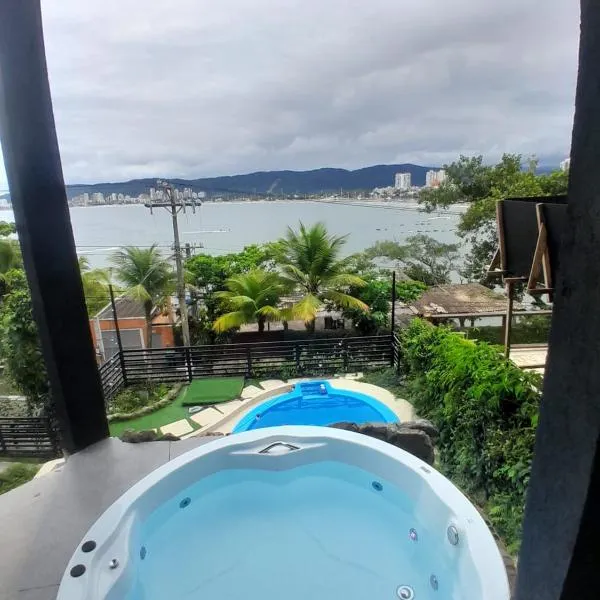Casamar paraíso na praia com a vista do mar dos sonhos piscina e spa, hotell sihtkohas Guarujá
