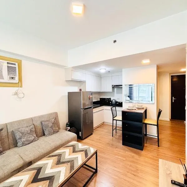 Abreeza Place Cozy Condo, hotel en Davao