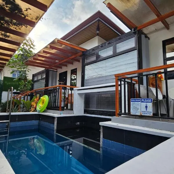 Jolie Joe's Bed and Breakfast with Shared Bathroom, hotel v destinaci Tagudin