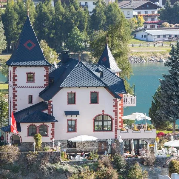 Hotel Schloesschen am See, hôtel à Curon Venosta