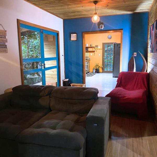 Casa na mata e pé na areia