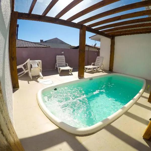 Residencial da Bia - Casas com 2 Dorms, Ar e Piscina Térmica e Coberta na Praia da Cal, hótel í Torres