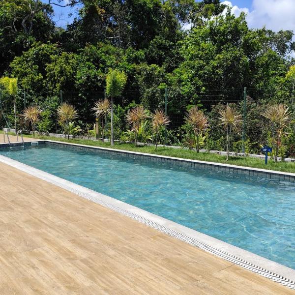 Aconchego da Alê em Porto, Ar condicionado e Piscina, Apartamento inteiro, Cozinha completa, Wifi, 02 Quartos confortáveis, travesseiro nasa , Colchão confortável ideal para férias descanso lazer ou negócios - Foto 4