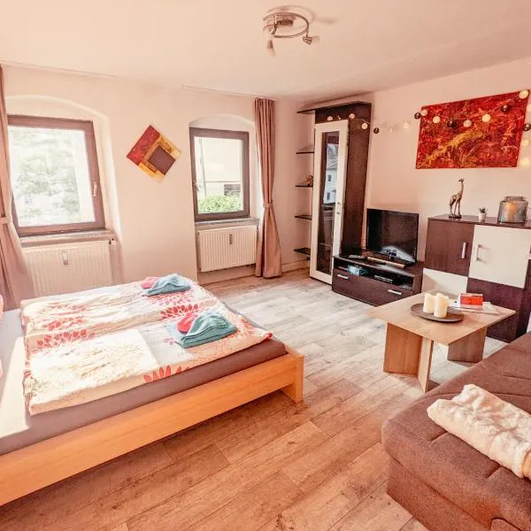 Famzi - Urlaubsmagie - Familienwohnung mit Gemeinschaftsgarten, -sauna & -pool, hotel v destinaci Sebnitz