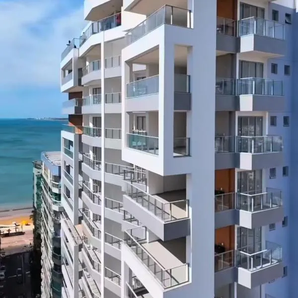 Apartamento NOvo na Praia do Morro Temporada Wi-Fi, Vista Mar, garagem, varanda grande, khách sạn ở Guarapari