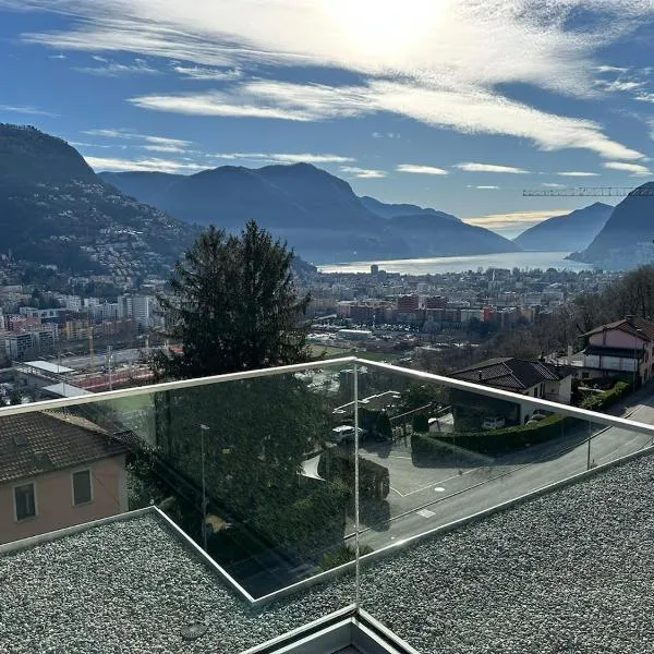 Luxury Penthouse, lake view, hotel v destinaci Porza