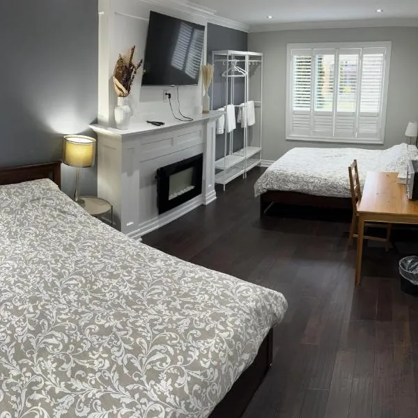 F3 Spacious room with 2 queen beds and TV, hotel v destinaci Mississauga