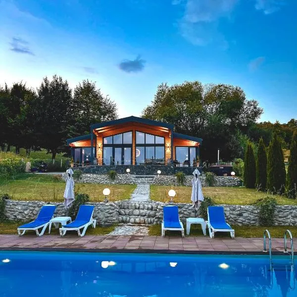 Balada dintre dealuri - Casa Soarelui si Casa Lunii, hôtel à Cisnădioara