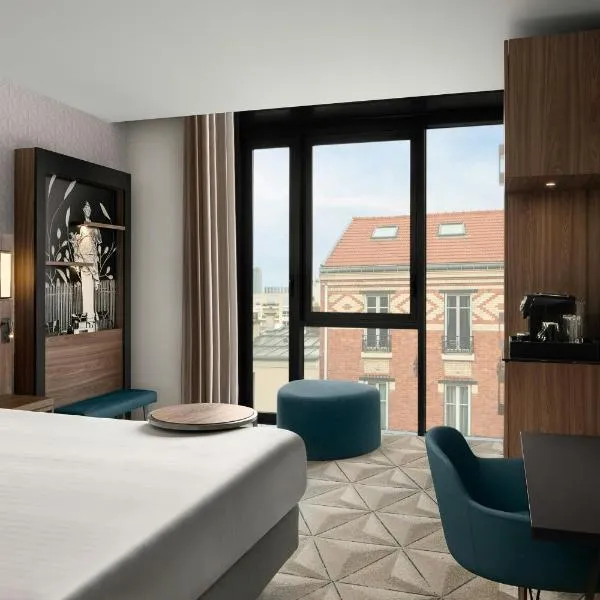 Courtyard by Marriott Paris Porte de Versailles โรงแรมในอิซซีเลมูลิโนต์
