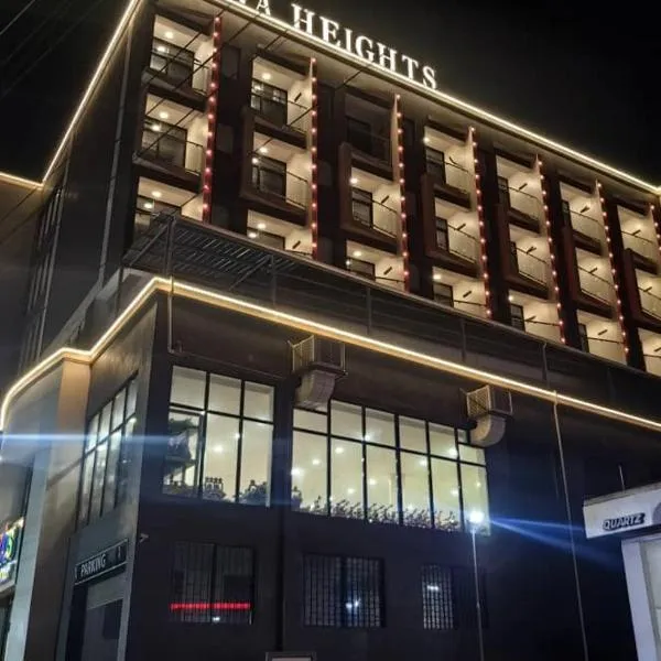 Ucha Hotel & Suites, ξενοδοχείο στην Καμπάλα