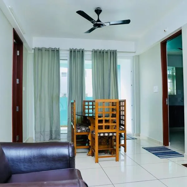 Luxe Oasis Palm Opposite LULU Mall Thiruvananthapuram, hotel in Trivandrum