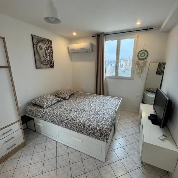 Studio cosy Paris La Défense Arena, hotel v destinácii Houilles