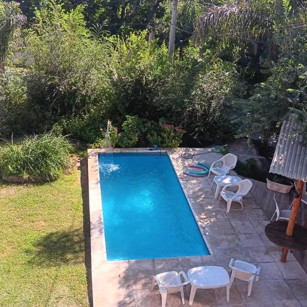 Cabaña frente al balneario diquecito solo familias, hotel in Villa Carlos Paz