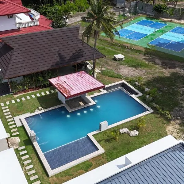 Bluewaves Hostel & Villa Panagsama by Hiverooms、モアルボアルのホテル