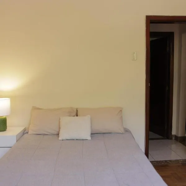 Quarto Casal com Varanda Casa Caramel, hotel v destinaci Belo Horizonte