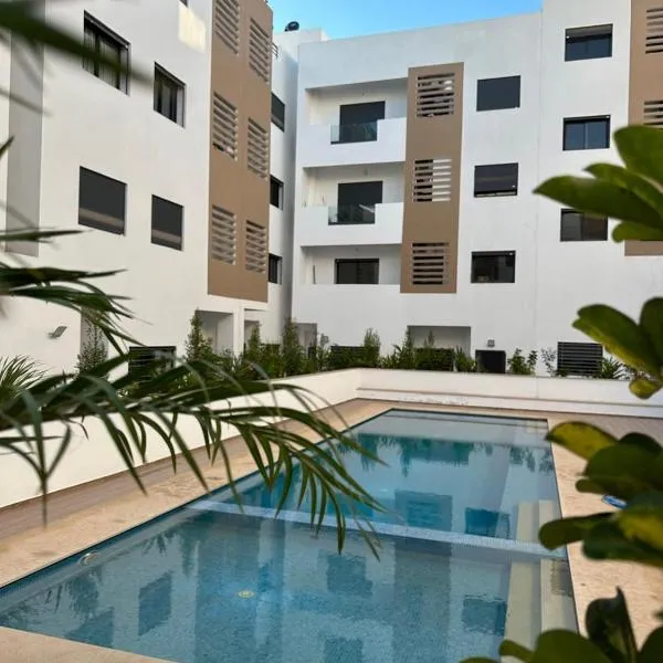 Bel Appartement à Harhoura pour les familles, hotel in El Harhoura