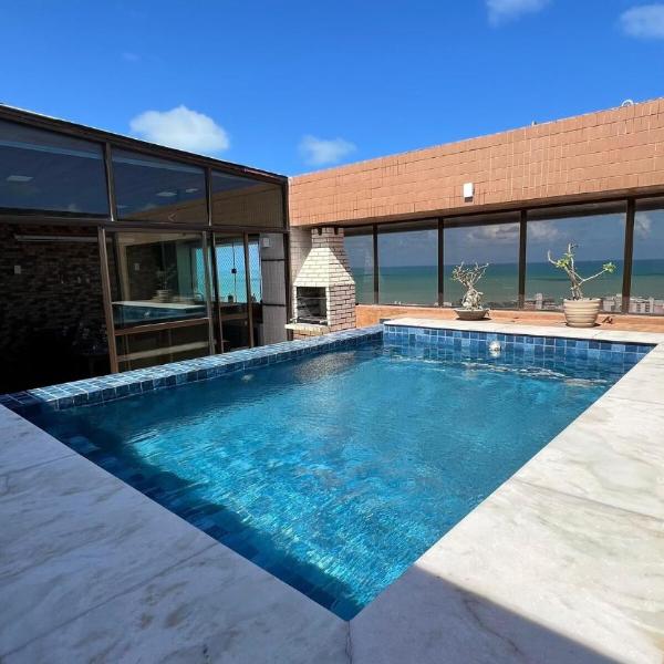 Cobertura com piscina privativa e vista para o mar