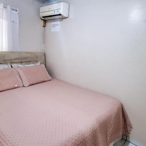 CASA TOP de 2 quartos em TORRES-RS - na mais bela praia Gaúcha - Cozinha - Banheiro - Ar-condicionado split em cada quarto- Smart TV 32' - Wi-Fi- Estacionamento - Anfitriã Superhost no BnB - Foto 2