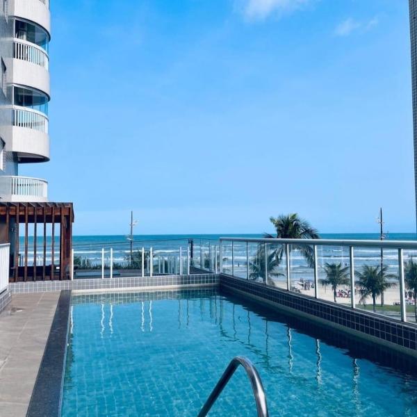 Vila Caiçara Apto à beira mar! Novinho