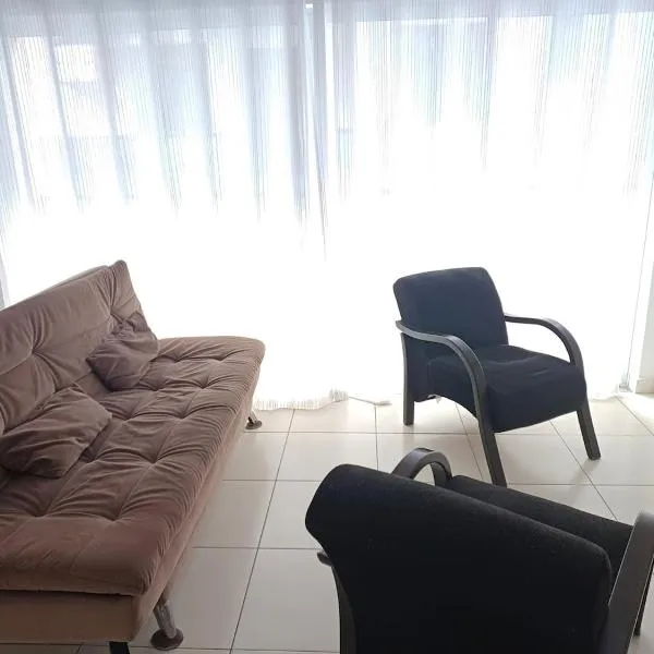 Apartamento com quarto com vista para o mar, quadra da praia