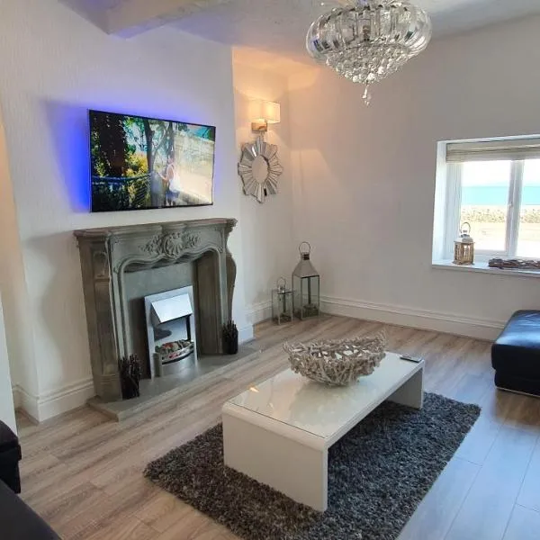 4 Harbour Views, hotel i Rhos-on-Sea