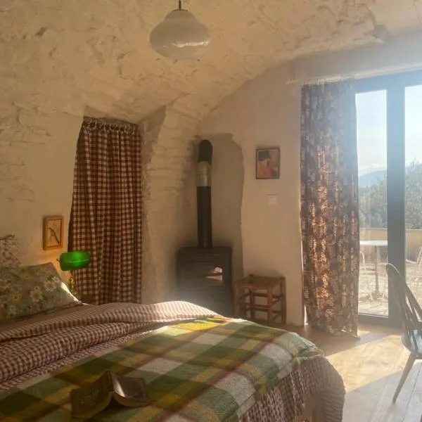 Habitación con cocina de verano jardín y entrada privada, hotel v destinaci Besiáns