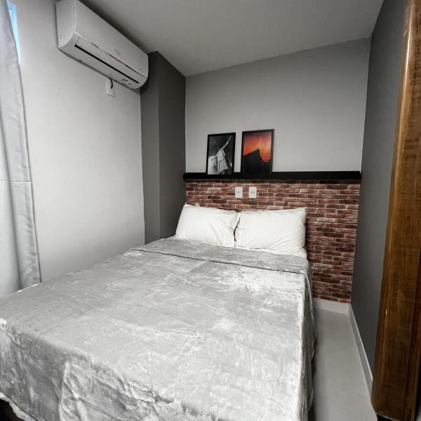 Loft Confortável com Ar, Cozinha e Wi-Fi no Centro
