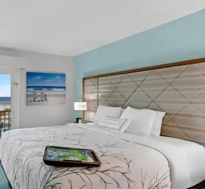 New 2025-Ocean Sands Beach Boutique Inn -Sauna and Saltwater-Mineral Pool until 4AM-Free Beach Bikes and Golf Carts for Famous Beach-50 Item Breakfast Buffet -PM Cookies and Popcorn -Ultra Sparkling Certified-Free Laundry -4 Grand Black Beds in all rooms, hotel a Kill Devil Hills