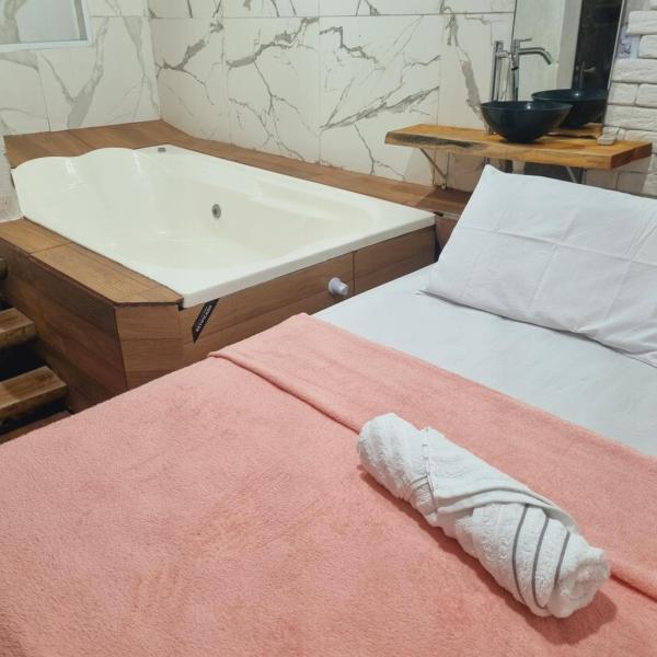 Quarto casal banheira