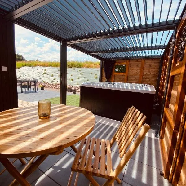 Le Gîte du Bonheur avec jacuzzi privatif, отель в городе Uriménil