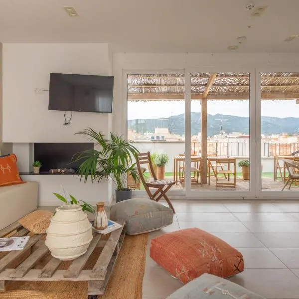 Hostal Boutique Es Portalet، فندق في سان فيليو دي غيكسولس