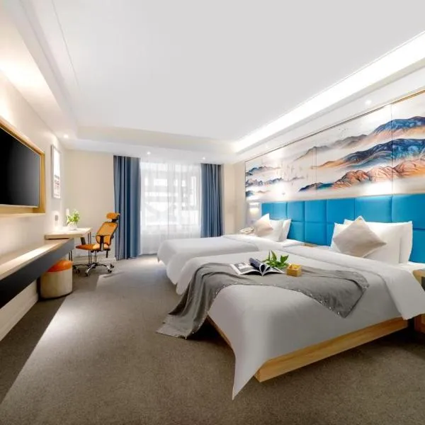 Happy Manju Hotel--Harbin Haxi High-speed Railway West Station Wanda Plaza Branch, hotel in Harbin
