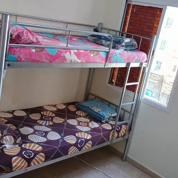 Cozy Vibes Hostel, отель в Маскате